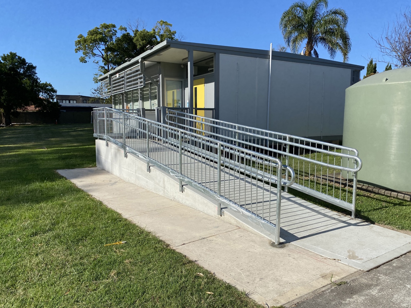 Completed accessibility ramp at a school